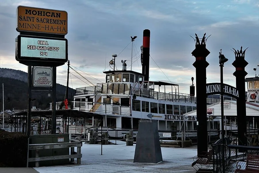 20 Coolest Small Towns in America: Discover the Best Getaways 3 Minne Ha Ha docked Lake George New York winter 1
